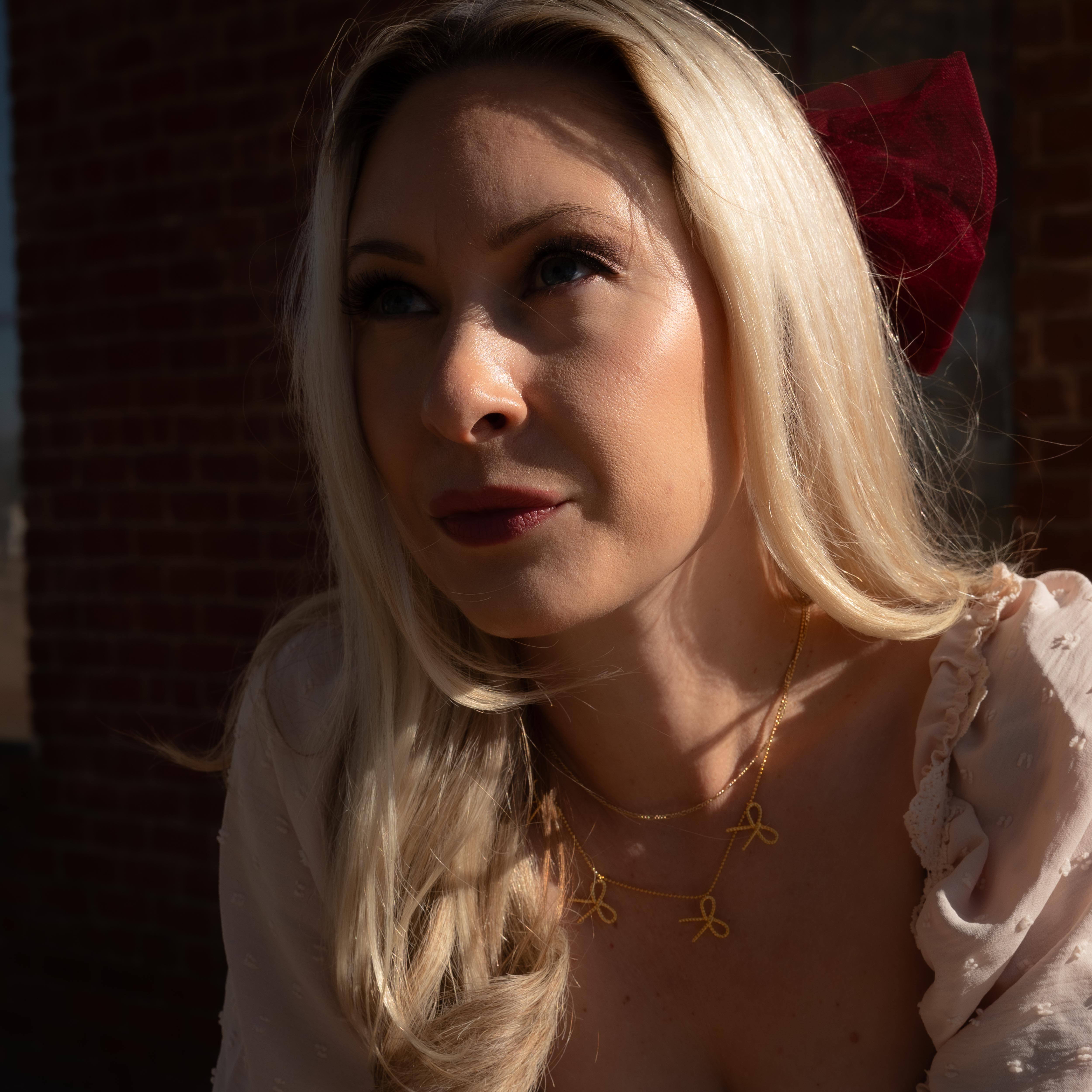 Emma Rope Bow Multi Charm Necklace